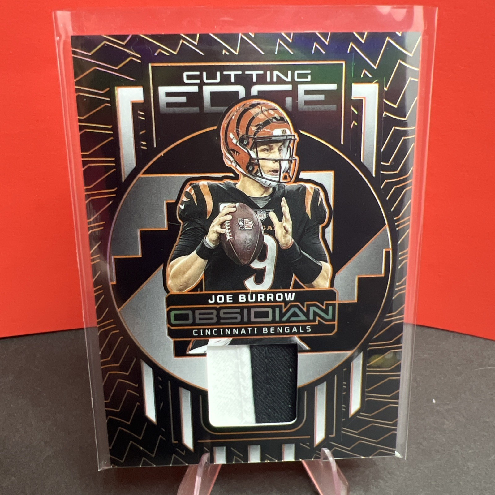 Joe Burrow QB-2023 Panini Obsidian - Orange Electric Etch MEM 07/49 SSP Bengals