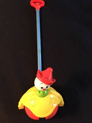Vintage 1979 Fisher Price Stick Push Toy - Rotating Clown Head When Pushed 