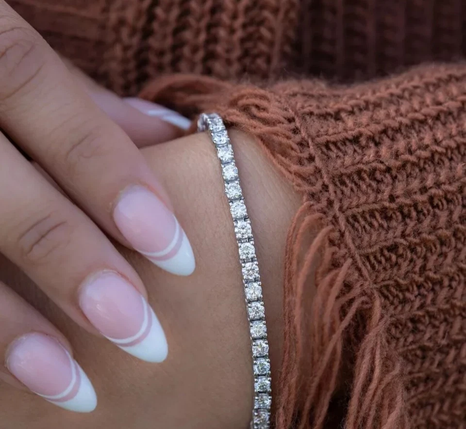 Brazalete de tenis de 7" de diamantes cultivados en laboratorio redondo de 5 quilates TW de oro blanco de 14 k (D/F/VS)