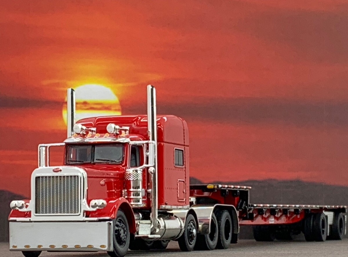 1/64 DCP PETERBILT 389 TRI AXLE W/ 70