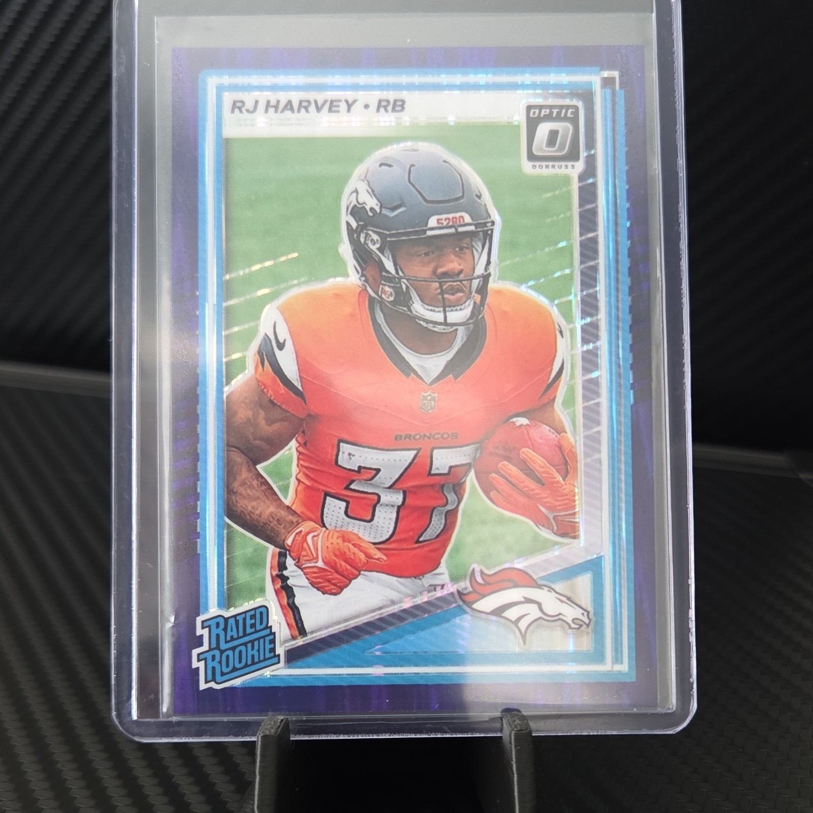 2025 Panini Donruss Optic Blue Scope Prizm RJ Harvey Rookie #208 Broncos