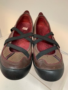 flats with straps across foot