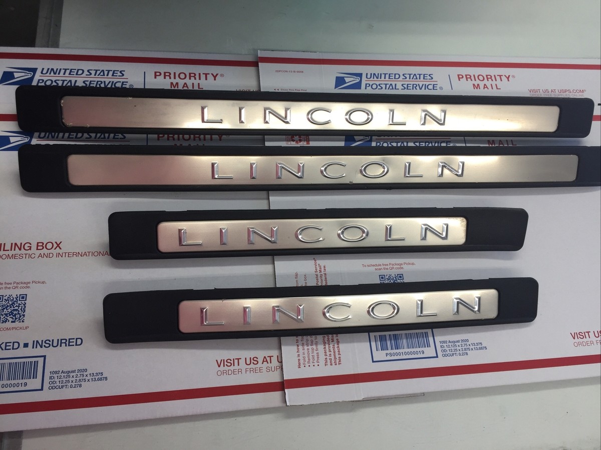 2003-2011 Lincoln Town Car Set of four Interior Sill Plates OEM