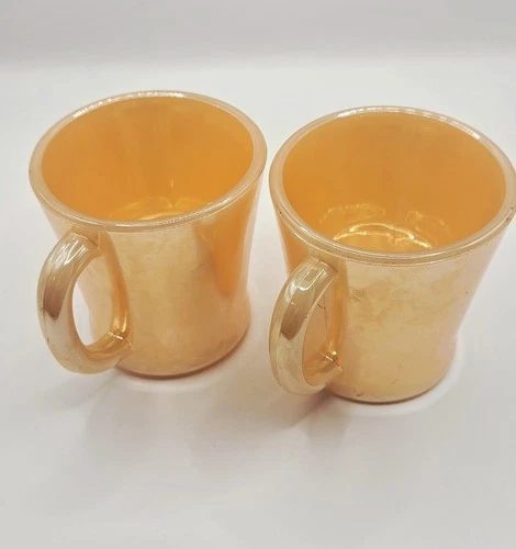 Vintage Fire King  Peach Luster Iridescent Coffee Mugs D Handle Set of 2. 