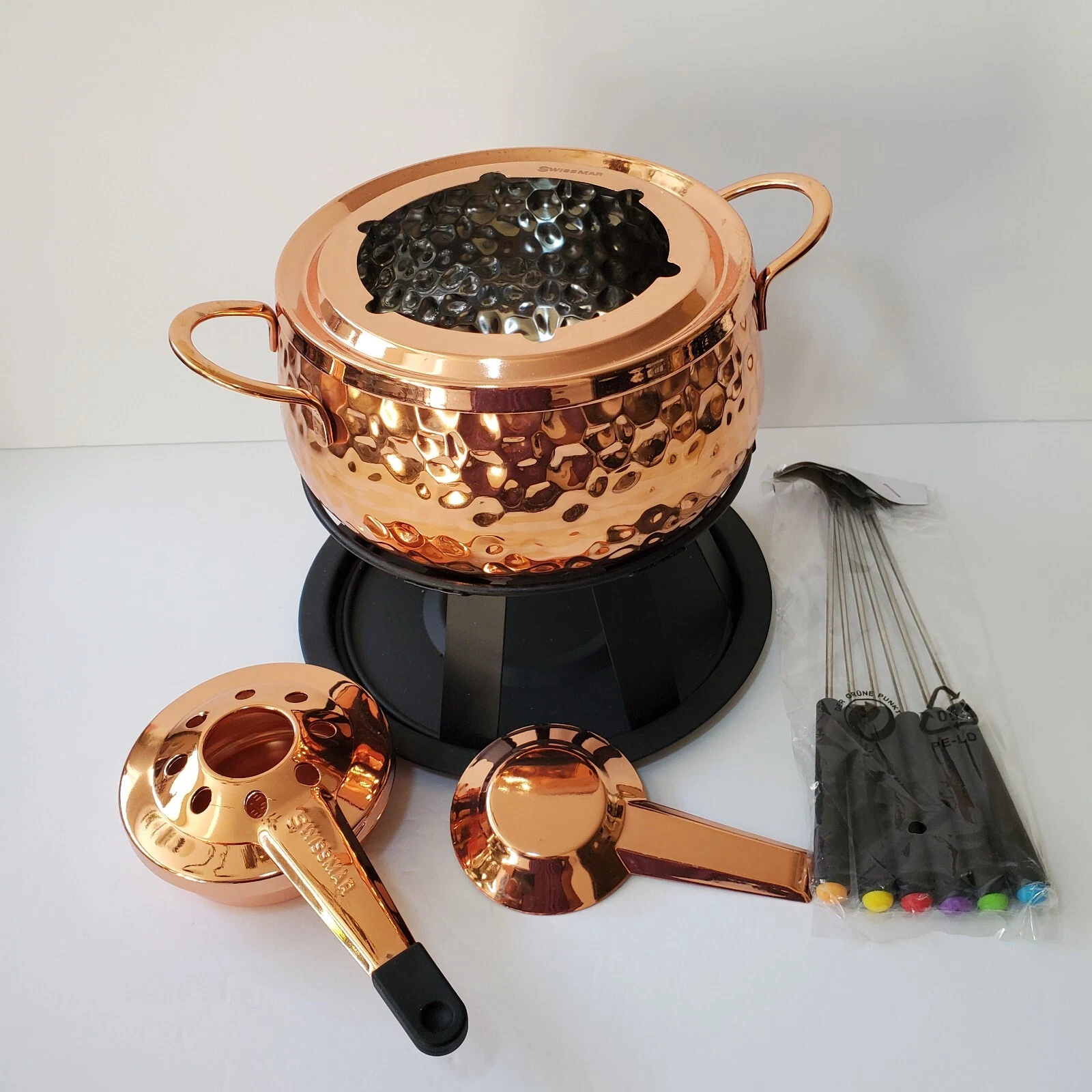 Swissmar 11 Piece Fondue Set Fondue Forks Single Burner Spatter Guard & Rechaud
Opens in a new windo