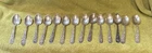 14  matching S. Kirk & Son sterling floral spoons