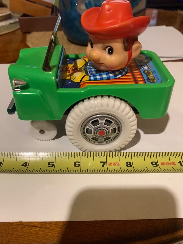 Vintage TM Trademark Brand Made in Japan Wind Up Tin Toy Wheelie Cowboy 