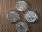 LOT OF 4 - SILVER PEACE DOLLARS  UNCIRCULATED -  1922,23,24 & 25 - AUTHENTIC