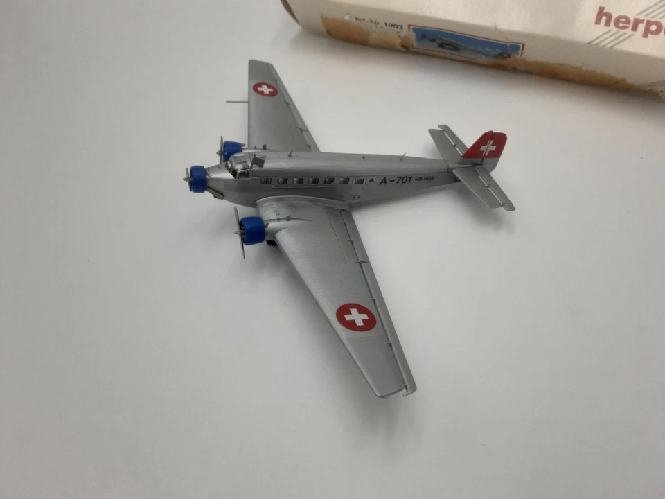 junkers JU 52/3m suisse herpa 1/160 boite carton usé sur un côté - Photo 3/4