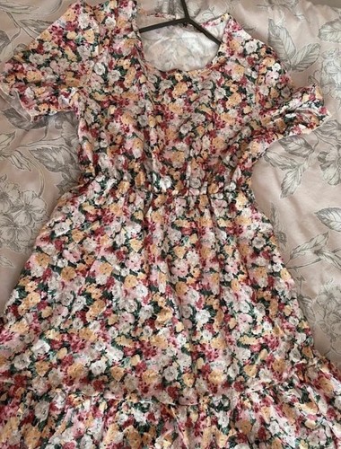 Ditsy Floral print Dress with Puff sleeves and ruffled Hem.