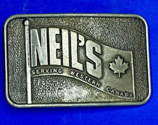 Neils, Serving Western Canada Promotional Advertising Vintage Belt Buckle