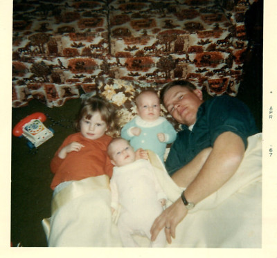 1967 Young Dad Lying On Floor With Kids Odd Cute Toy Telephone Vintage Photo