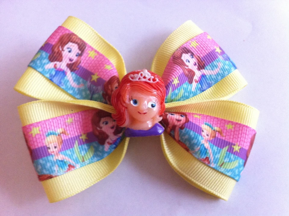 Moño de pelo para niñas de 4" de ancho Sofía la primera cinta amarilla Oona pasador francés Foto 2 de 3