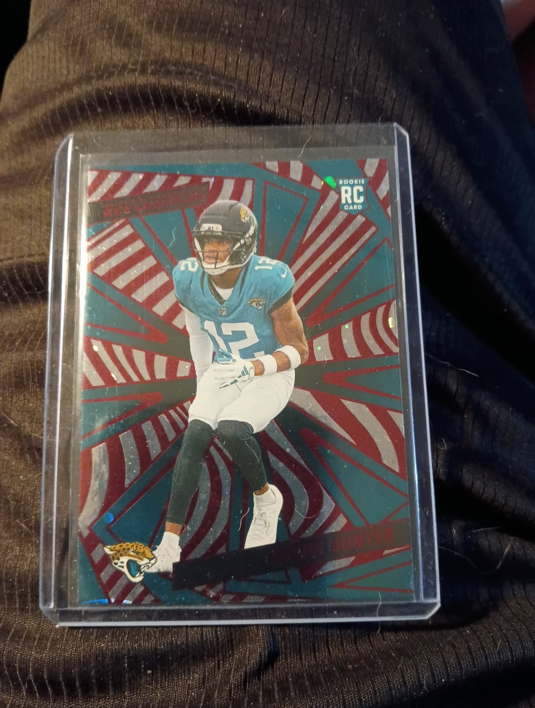 2025 Panini Revolution - Rookies Travis Hunter #242 Red Cosmo (RC)