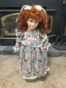 doll with red curly hair