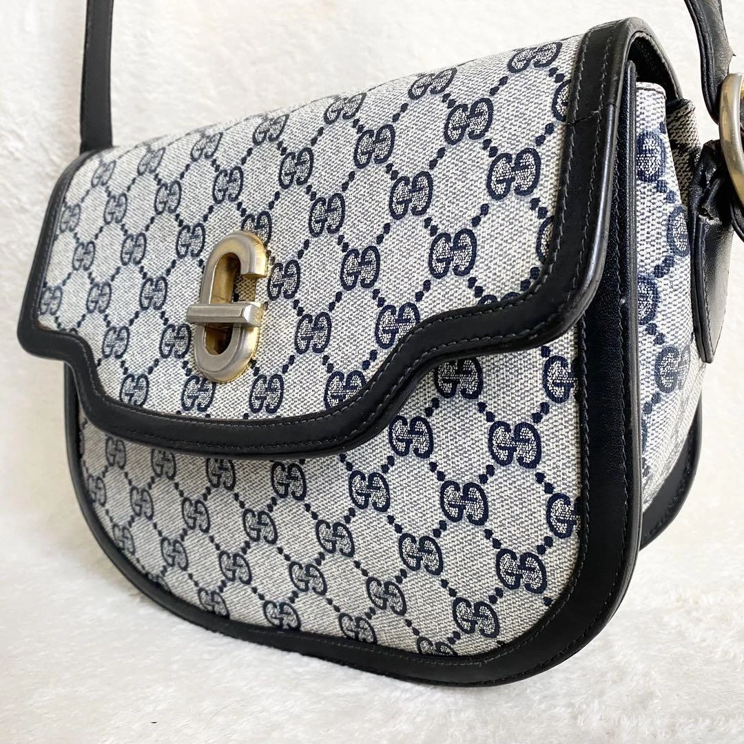 Gucci sac à bandoulière vintage motif GG quincaillerie dorée rare