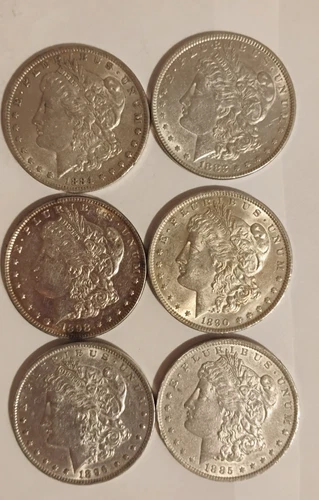 SIX AU MORGANS SILVER DOLLARS
