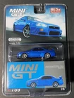 Mini GT Nissan Skyline. GT-R (R34) V-Spec Bayside Blue #00759 1/64