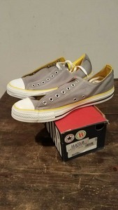 grey and yellow converse