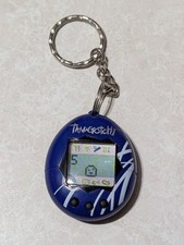Vintage 1997 Blue and White Tamagotchi Working/Read 