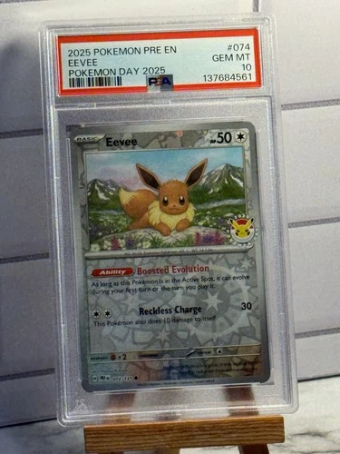 2025 POKEMON PRE EN-PRISMATIC EVOLUTIONS POKEMON DAY 2025 #074 EEVEE PSA 10