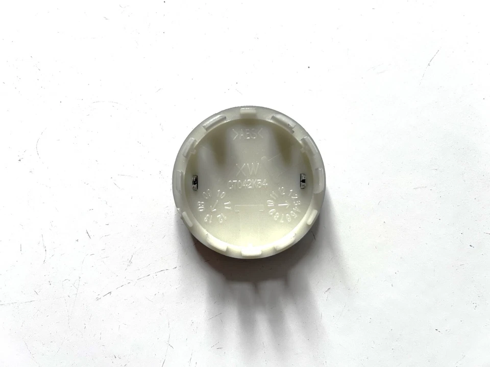 Tapa central llanta Nissan Rogue Leaf X-Trail Sentra Máxima 2002-2019 2-1/8" Foto 3 de 4