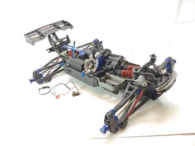 *RARE* TRAXXAS E-REVO 1.0 BRUSHLESS EDITION 1/8 MONSTER TRUCK ROLLER SLIDER CHAS