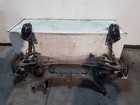 Rear axle beam with reducer