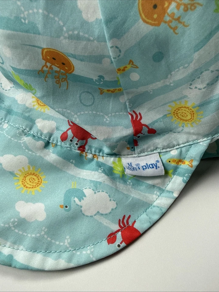 Sombrero para el sol bebé i play UPF 50+ estampado azul vida marina 9-18 meses correa ajustable Foto 2 de 4