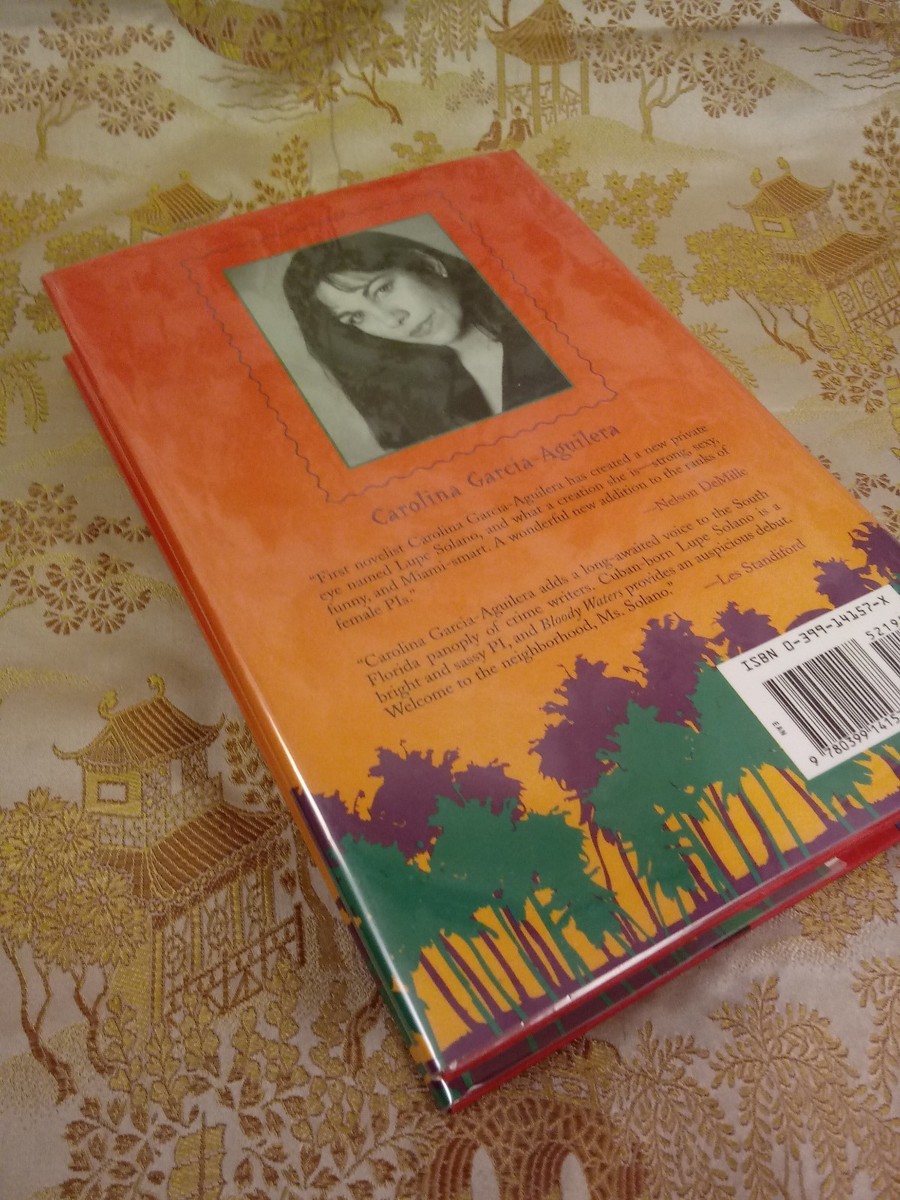 Bloody Waters: A Lupe Solano Mystery [Book]