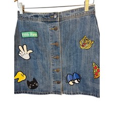 VINTAGE STYLE 6ixty8ight denim mini skirt featuring embroidered patches.