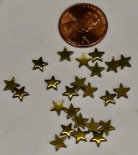 VINTAGE 24 TINY FLAT BRASS STARS  5.5mm. tiny metal stars  SHINY  SCRAPBOOKING