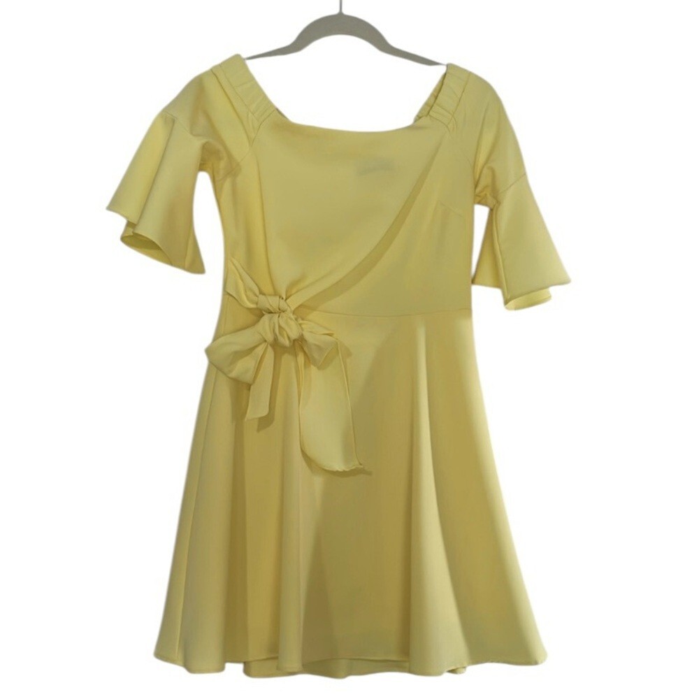 butter yellow fit and flare dress 18 Best Ways to Wear Butter Yellow for Spring and Summer 2025