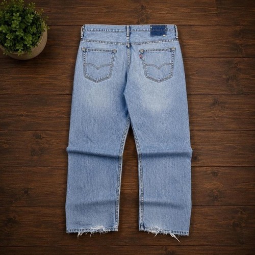 Crazy Vintage 2000's Light Blue Washed Distressed Levi's Jeans