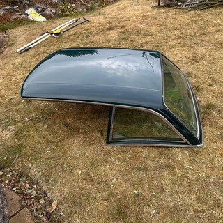 triumph stag hard top in british racing green (i have been told)