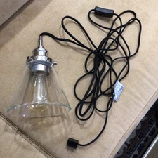 Glass and chrome handing light with switch.