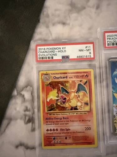 Pokémon TCG Charizard Evolutions Holo Rare 11/108 2016 PSA 8
