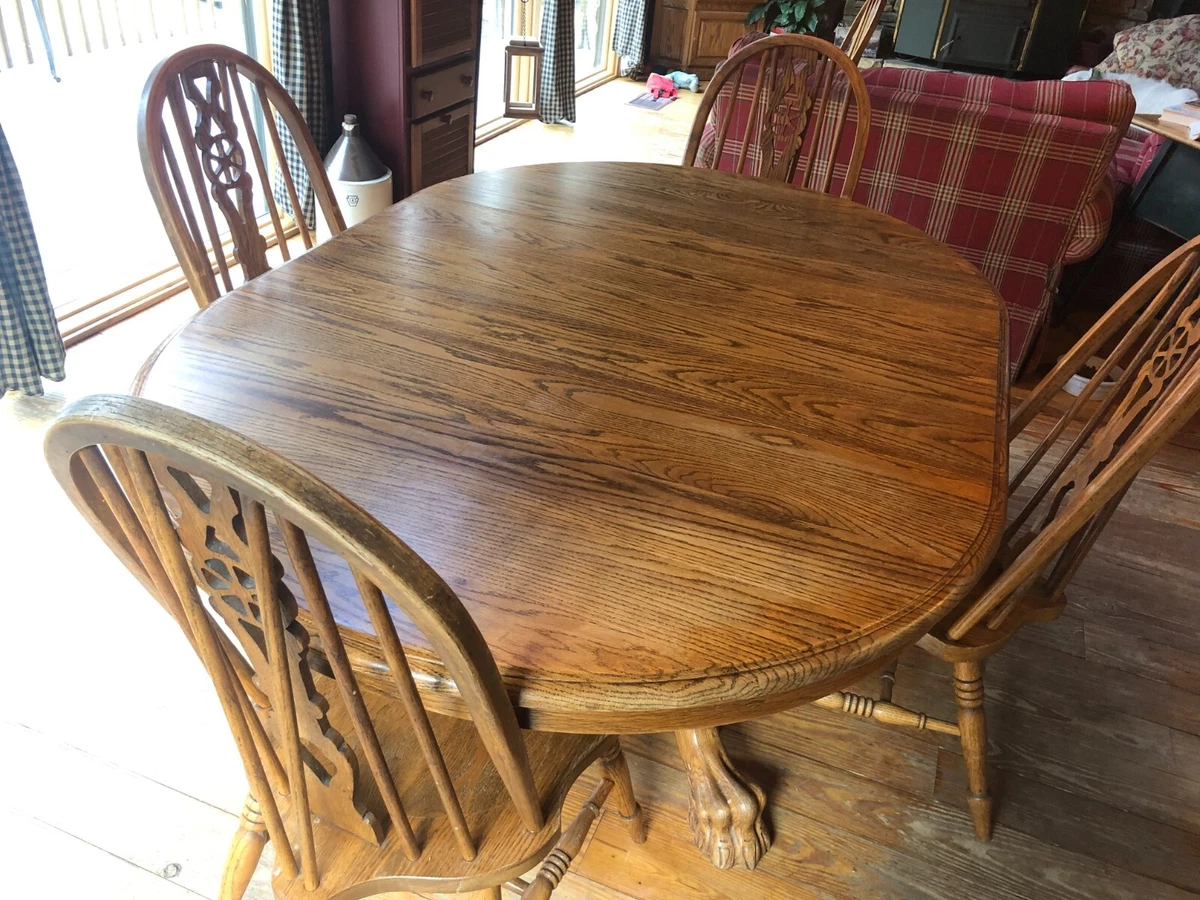 solid oak dining table and chairs