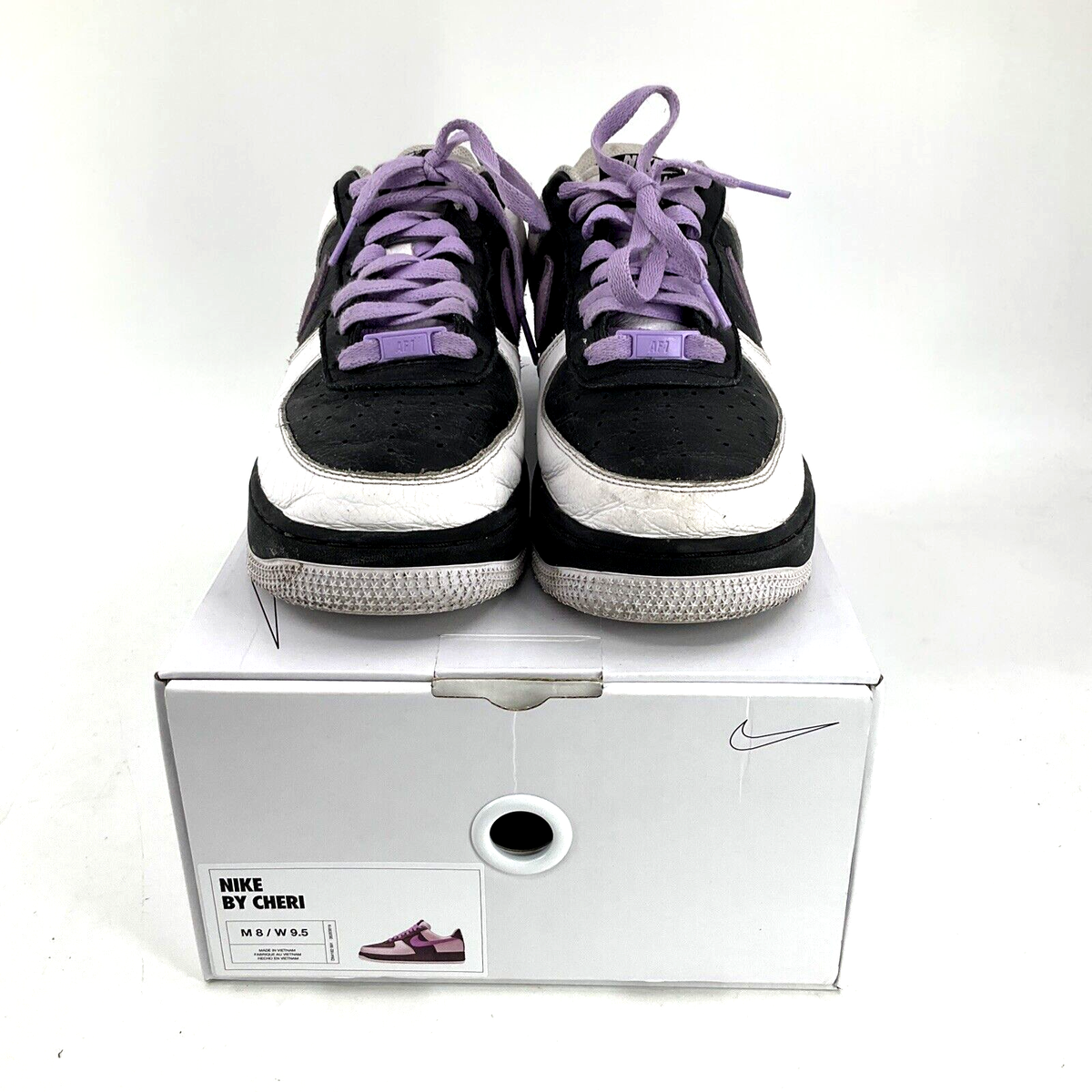 black air force 1 with purple swoosh