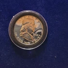 silver coin 1962 Franklin proof half dollar.