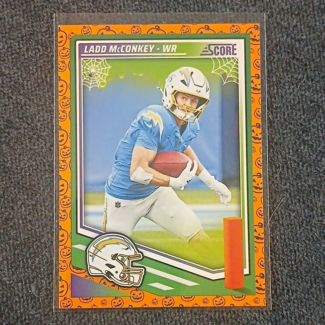 Panini 2025 Score Football Ladd McConkey #65 Pumpkin Parallel Rookie Chargers