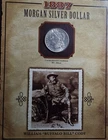 A 1887 P MORGAN SILVER DOLLAR WITH BUFFALO BILL CODY STAMP AND INFORMATION CARD