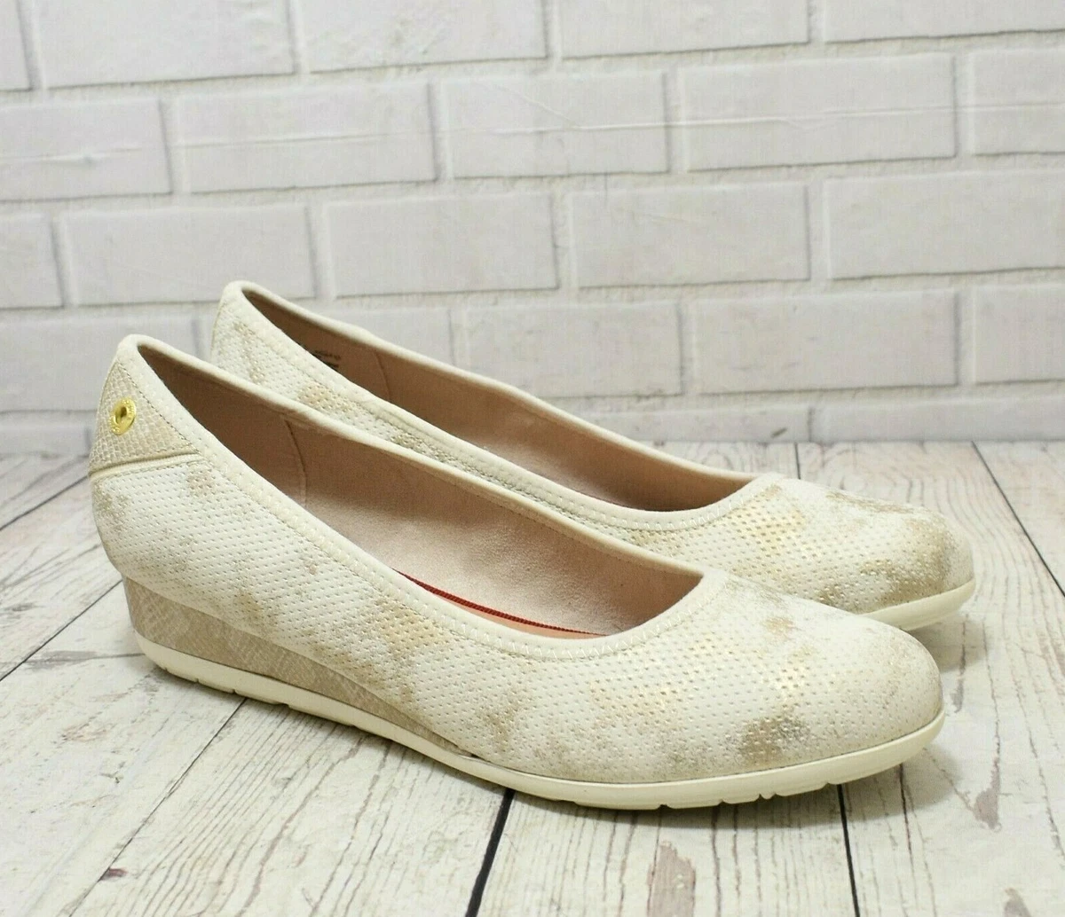 Cream wedge hotsell shoes uk