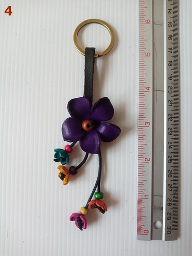 La combinación perfecta de estilo y función: un llavero de flores de cuero n.º03-1 - Imagen 14 de 19