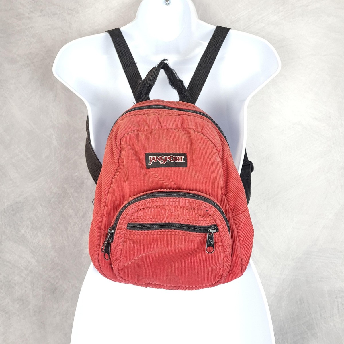jansport bag small Half Pint Mini Backpack The Mini Break is a compact pouch designed to keep your small essentialslike earbuds JANSPORT Right Pack Mini Backpack