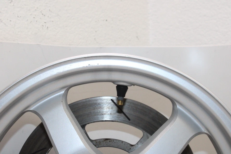 03-06 SUZUKI BURGMAN AN400S OEM FRONT WHEEL RIM - Image 3 of 4