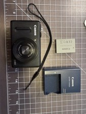 Canon PowerShot S100 IS 12.1MP Digital Camera...