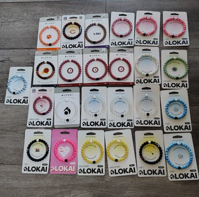 LOT OF 24 LOKAI BRACELETS WATER FROM MT. EVEREST MUD FROM THE DEAD SEA - Image 1 of 4
