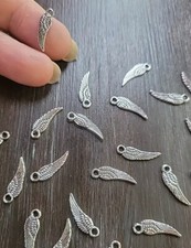 36 x Tibetan Silver Wing Charms. U.S. Seller.