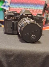 Canon A-1 35mm SLR Film Camera with 50 mm lens Kit